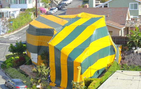 House covered by a tent for fumigation